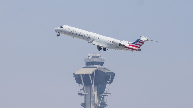 An American Airlines American Eagle plane takes off at LAX in Los Angeles, Calif., Saturday, June 11, 2022. The Canadian Transportation Agency says the total number of complaints it faced about air travel rose last year, boosted by a backlog of issues carried over from the previous year. THE CANADIAN PRESS/Sean Kilpatrick