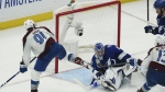 Colorado Avalanche center Nazem Kadri shoots the puck into the top of the goal past Tampa Bay Lightning goaltender Andrei Vasilevskiy (88) for a goal during overtime of Game 4 of the NHL hockey Stanley Cup Finals on Wednesday, June 22, 2022, in Tampa, Fla. THE CANADIAN PRESS/AP-John Bazemore