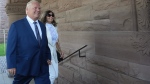Premier Doug Ford and his wife Karla Ford arrive to announce his new cabinet at the swearing-in ceremony at Queen’s Park in Toronto on June 24, 2022. THE CANADIAN PRESS/Nathan Denette
