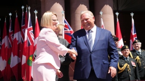 Sylvia Jones, Deputy Premier and Minister of Health shakes hands with Premier Doug Ford as she takes her oath at the swearing-in ceremony at Queen’s Park in Toronto on June 24, 2022. THE CANADIAN PRESS/Nathan Denette