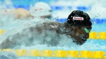 Joshua Liendo of Canada competes during the men's 100m butterfly semifinal at the 19th FINA World Championships in Budapest, Hungary, Thursday, June 23, 2022. Liendo claimed his second medal at the world aquatics championships with a bronze in the men's 100-metre butterfly Friday. THE CANADIAN PRESS/AP-Petr David Josek