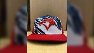 The Toronto Blue Jays have altered the design of an upcoming special edition cap, seen in an undated handout photo, which they are set to wear on the Fourth of July. THE CANADIAN PRESS/HO-Toronto Blue Jays, 
