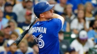 Toronto Blue Jays' Matt Chapman watches his solo home run against the Milwaukee Brewers during the fifth inning of a baseball game Saturday, June 25, 2022, in Milwaukee. (AP Photo/Jon Durr)