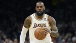 Los Angeles Lakers forward LeBron James (6) during the first half of an NBA basketball game against the Phoenix Suns, Sunday, Jan. 13, 2022, in Phoenix. (AP Photo/Rick Scuteri, File)