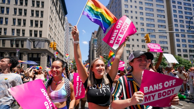 Revelers with Planned Parenthood march down Fifth Avenue during the annual NYC Pride March, Sunday, June 26, 2022, in New York. (AP Photo/Mary Altaffer)