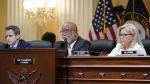 Chairman Bennie Thompson, D-Miss., center, speaks as the House select committee investigating the Jan. 6 attack on the U.S. Capitol continues to reveal its findings of a year-long investigation, at the Capitol in Washington, Thursday, June 23, 2022. Rep. Adam Kinzinger, R-Ill., left, and Vice Chair Liz Cheney, R-Wyo., right, listen. (AP Photo/J. Scott Applewhite)