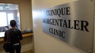 A woman enters the Morgentaler clinic in Montreal, Wednesday, May 29, 2013. THE CANADIAN PRESS/Ryan Remiorz