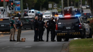 Saanich Police joined by Victoria Police and RCMP respond to reports of gunfire involving multiple people and injuries reported during an active situation in Saanich, B.C., on Tuesday, June 28, 2022 THE CANADIAN PRESS/Chad Hipolito 