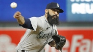 Seattle Mariners relief pitcher Sergio Romo throws to the Minnesota Twins in the sixth inning of a baseball game Monday, April 11, 2022, in Minneapolis. THE CANADIAN PRESS/AP-Bruce Kluckhohn