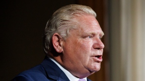 Ontario Premier Doug Ford speaks alongside Toronto Mayor John Tory during a joint press conference inside Queen’s Park in Toronto, Monday, June 27, 2022. THE CANADIAN PRESS/Cole Burston