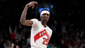 Toronto Raptors forward Chris Boucher (25) celebrates after draining a 3 pointer during first half NBA first round playoff action against the Philadelphia 76ers in Toronto on Wednesday April 20, 2022. THE CANADIAN PRESS/Nathan Denette 