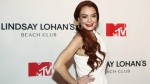 FILE - Lindsay Lohan attends MTV's "Lindsay Lohan's Beach Club" series premiere party at Magic Hour Rooftop at The Moxy Times Square on Jan. 7, 2019, in New York. Lohan is celebrating her 36th birthday on Saturday as a married woman. The “Freaky Friday” star said she was the “luckiest woman in the world” in an Instagram post Friday, July 1, 2022, that pictured her with financier Bader Shammas, who had been her fiance. (Photo by Andy Kropa/Invision/AP, File)