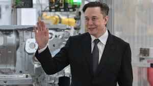 FILE - Tesla CEO Elon Musk attends the opening of the Tesla factory Berlin Brandenburg in Gruenheide, Germany, Tuesday, March 22, 2022. Musk has used Twitter to announce he had met with Pope Francis. Musk used the @Pontifex handle in tweeting that he was â€œhonoredâ€ to meet with Francis on Friday, July 1, 2022. (Patrick Pleul/Pool via AP, File)