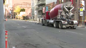 A cyclist was struck by a cement truck in the area of Adelaide Street West and Portland Street.