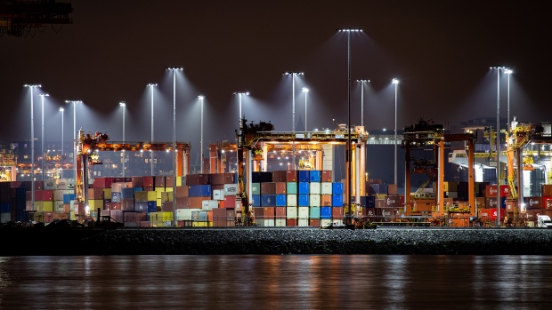 Cargo containers are seen stacked at port, in Vancouver, on Thursday, February 10, 2022. THE CANADIAN PRESS/Darryl Dyck