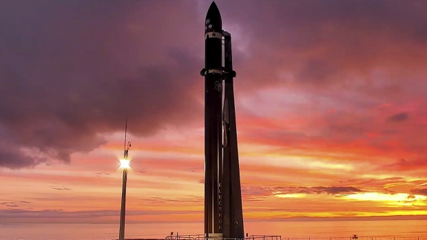Rocket Lab's Electron rocket waits on the launch pad on the Mahia peninsula in New Zealand, Tuesday, June 28, 2022. NASA wants to experiment with a new orbit around the moon which it hopes to use in the coming years to once again land astronauts on the lunar surface. (Rocket Lab via AP)