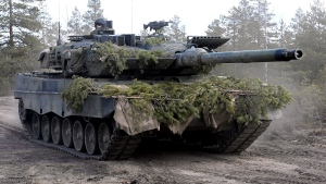 A Leopard battle tank of the Armoured Brigade is seen during the Army mechanised exercise Arrow 22 exercise at the Niinisalo garrison in Kankaanp'', Western Finland, on May 4, 2022. Finland appears on the cusp of joining NATO. Sweden could follow suit. By year's end, they could stand among the alliance's ranks. Russia's war in Ukraine has provoked a public about face on membership in the two Nordic countries. They are already NATO's closest partners, but should Russia respond to their membership moves they might soon need the organization's military support. (Heikki Saukkomaa/Lehtikuva via AP)