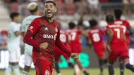 Toronto FC midfielder Alejandro Pozuelo celebrates after teammate Ralph Priso, not shown, scores his team's game winning goal against Atlanta United during second half MLS action in Toronto on Saturday June 25, 2022. Pozuelo is leaving Toronto FC for Inter Miami FC. THE CANADIAN PRESS/Chris Young