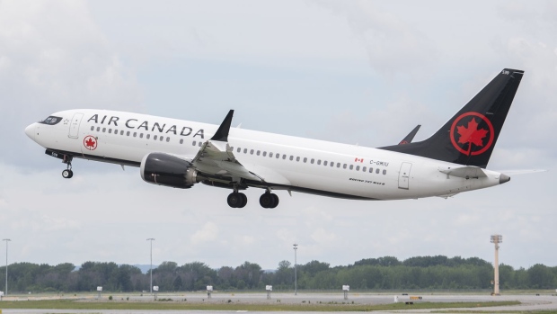An Air Canada jet takes off from Trudeau Airport in Montreal, Thursday, June 30, 2022. THE CANADIAN PRESS/Graham Hughes