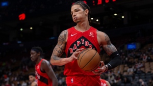 Toronto Raptors' D.J. Wilson gathers the ball  during NBA basketball action against the Philadelphia 76ers in Toronto on Tuesday, December 28, 2021. THE CANADIAN PRESS/Chris Young