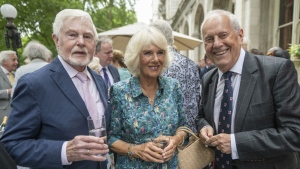 From left, Derek Jacobi, Camilla, Duchess of Cornwall and Gyles Brandreth during The Oldie Luncheon, in celebration of her 75th Birthday at National Liberal Club, London, Tuesday July 12, 2022. (David Rose, Pool Photo via AP)