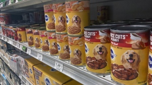 Various types of dog food are seen on display in a supermarket Tuesday, July 19, 2022, in Orlando, Fla. In 2018, the FDA began investigating whether the increasing popularity of grain-free dog foods had led to a sudden rise in a potentially fatal heart disease in dogs. Four years later, the FDA has reached no conclusion, but the publicity surrounding the issue has shrunk the once-promising market for grain-free dog foods. (AP Photo/John Raoux)