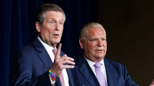 Toronto mayor John Tory, left, speaks alongside Ontario premier Doug Ford during a joint press conference inside Queen’s Park in Toronto, Monday, June 27, 2022. THE CANADIAN PRESS/Cole Burston