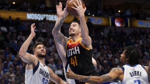 Former Utah Jazz forward Juancho Hernangomez (41) goes up to shoot as Dallas Mavericks' Maxi Kleber (42) and Trey Burke (3) defend in the first half of Game 2 of an NBA basketball first-round playoff series, on April 18, 2022, in Dallas. The Toronto Raptors have signed Hernangomez. Terms were not disclosed, but ESPN reported the deal is for one year. THE CANADIAN PRESS/AP-Tony Gutierrez