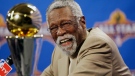 FILE - NBA great Bill Russell reacts at a news conference as he learns the most valuable player award for the NBA basketball championships has been renamed the Bill Russell NBA Finals Most Valuable Player Award, Feb. 14, 2009, in Phoenix. Russell has died at age 88. His family said on social media that Russell died on Sunday, July 31, 2022. Russell anchored a Boston Celtics dynasty that won 11 titles in 13 years. (AP Photo/Matt York, file)