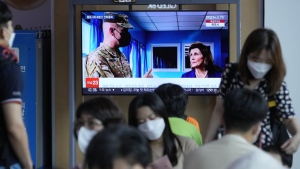 A TV screen shows a news program reporting about U.S. House Speaker Nancy Pelosi was visiting the Joint Security Area of the inter-Korean truce village of Panmunjom, at the Seoul Railway Station in Seoul, South Korea, Friday, Aug. 5, 2022. North Korea on Saturday, Aug. 6, called U.S. House Speaker Pelosi “the worst destroyer of international peace and stability,” accusing her of inciting anti-North Korea sentiment and enraging China during her Asian tour earlier this week.(AP Photo/Ahn Young-joon)