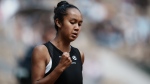 Canada's Leylah Fernandez clenches her fist after scoring a point against Italy's Martina Trevisan during their quarterfinal match at the French Open tennis tournament in Roland Garros stadium in Paris, France, Tuesday, May 31, 2022. THE CANADIAN PRESS/AP /Thibault Camus