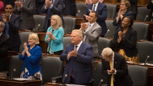 Ontario Premier Doug Ford claps during Ted Arnott's acceptance speech for his re-election to the position of Speaker of the Ontario Legislative Assembly at Queen's Park, in Toronto on Monday, August 8, 2022. THE CANADIAN PRESS/Tijana Martin 