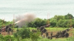 Taiwan's military conducts artillery live-fire drills at Fangshan township in Pingtung, southern Taiwan, Tuesday, Aug. 9, 2022. Taiwan's official Central News Agency reported that Taiwan's army will conduct live-fire artillery drills in southern Pingtung county on Tuesday and Thursday, in response to the Chinese exercises. (AP Photo/Johnson Lai)