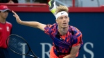 Canada's Denis Shapovalov serves to Alex de Minaur of Australia during first round of play at the National Bank Open tennis tournament Tuesday August 9, 2022 in Montreal. THE CANADIAN PRESS/Paul Chiasson