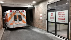 An ambulance is parked at the emergency department at the Lakeridge Health hospital in Bowmanville, Ont. on Wednesday January 12, 2022. Ontario’s health minister would not rule out further privatization in health care among a number of possibilities being considered as the province deals with major staff shortages in hospitals.THE CANADIAN PRESS/Doug Ives