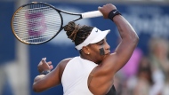 Serena Williams, of the USA, returns the ball against Belinda Bencic, of Switzerland, during the National Bank Open tennis tournament in Toronto on Wednesday, August 10, 2022. THE CANADIAN PRESS/Nathan Denette