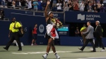 Serena Williams, of the USA, leaves the court carrying flowers and waving to fans after her defeat against Belinda Bencic, of Switzerland, during the National Bank Open tennis tournament in Toronto on Wednesday, August 10, 2022. No one knows exactly how many more matches Williams will play before walking away, and the 23-time Grand Slam champion exited the National Bank Open on Wednesday night with a 6-2, 6-4 loss to Bencic. THE CANADIAN PRESS/Nathan Denette