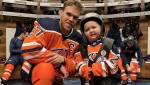 Ben Stelter and Connor McDavid are shown in the Oilers locker room in a handout photo. Oilers captain McDavid called six-year-old Ben Stelter "an amazing little guy who lit up every single room he walked in." Stelter, who served as the team's good-luck charm during their march to the Western Conference final this past spring, died Tuesday. The super fan was diagnosed with glioblastoma, a form of brain cancer, before his fifth birthday. THE CANADIAN PRESS/HO-Mike Stelter 
