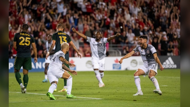 Toronto FC Midfielder Lorenzo Insigne (24) celebrates his goal against Portland Timbers with teammates during second half MLS Soccer action in Toronto, on Saturday, August 13, 2022. THE CANADIAN PRESS/Andrew Lahodynskyj