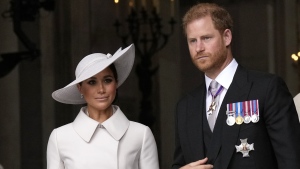 FILE Prince Harry and Meghan, Duchess of Sussex leave after a service of thanksgiving for the reign of Queen Elizabeth II at St Paul's Cathedral in London, Friday, June 3, 2022 on the second of four days of celebrations to mark the Platinum Jubilee. Prince Harry and his wife Meghan, the Duchess of Sussex, will visit the U.K. in September for the first time since they returned for Queen Elizabeth II’s Platinum Jubilee celebrations. A spokesperson for the couple said they will “visit with several charities close to their hearts” in the U.K. and Germany. (AP Photo/Matt Dunham, Pool, File)