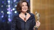 Lisa LaFlamme holds her award for best news anchor at the Canadian Screen Awards in Toronto on March 1, 2015. Veteran news anchor Lisa LaFlamme says she was "blindsided" as Bell Media ended her contract at CTV National News after 35 years, a "business decision'' it says will move the chief news anchor role in "a different direction.'' THE CANADIAN PRESS/Frank Gunn