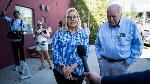 Rep. Liz Cheney, R-Wyo., arrives, with her father, former Vice President Dick Cheney, to vote at the Teton County Library during the Republican primary election on Tuesday, Aug. 16, 2022, in Jackson Hole, Wyo. (Jabin Botsford/The Washington Post via AP)