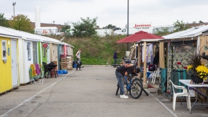 Ontario's mayors, police leaders and businesses are pushing the province for more help to deal with the growing homelessness and opioid crisis that is gripping cities both big and small. A general view of the "A Better Tent City" community In Kitchener, Ontario, on Thursday October 14, 2021. The community provides small cabins set up as an alternative to the homeless shelter system in the area. THE CANADIAN PRESS/Chris Young