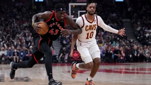 Toronto Raptors forward Pascal Siakam (43) drives past Cleveland Cavaliers guard Tim Frazier (10) during first half NBA basketball action in Toronto, Thursday, March 24, 2022. THE CANADIAN PRESS/Nathan Denette 