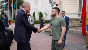 In this photo provided by the Ukrainian Presidential Press Office, Ukrainian President Volodymyr Zelenskyy, right, shakes hands with Turkish President Recep Tayyip Erdogan during their meeting in Lviv, Ukraine, Thursday, Aug. 18, 2022. (Ukrainian Presidential Press Office via AP)