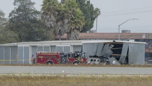 Wreckage from a plane crash at Watsonville Municipal Airport in Watsonville, Calif., Thursday, Aug. 18, 2022. (AP Photo/Nic Coury)