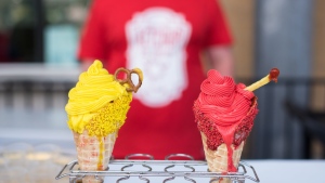 Mock-ups for the mustard and ketchup ice cream from So Cute Ice Cream, are put on display during the media preview event for the Canadian National Exhibition in Toronto, on Wednesday, August 17, 2022. THE CANADIAN PRESS/Tijana Martin