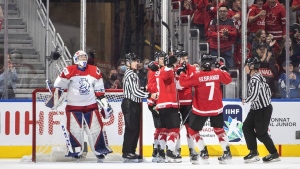 Canada celebrates a goal as Czechia goalie Pavel Cajan (1) looks on during third period IIHF World Junior Hockey Championship semifinal action in Edmonton on Friday August 19, 2022. THE CANADIAN PRESS/Jason Franson