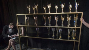 Organizers say next year's Canadian Screen Awards will drop categories for male and female performers in favour of unspecified acting categories "to better represent the country's diverse community of talent." A rack of trophies are seen backstage at the 2017 Canadian Screen Awards in Toronto on Sunday, March 12, 2017. THE CANADIAN PRESS/Chris Young
