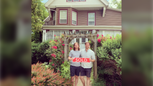 Marty Butler and Stefan Palios are seen in this photograph standing in front of their new bed and breakfast. (Instagram/@attemptingvictorian)
